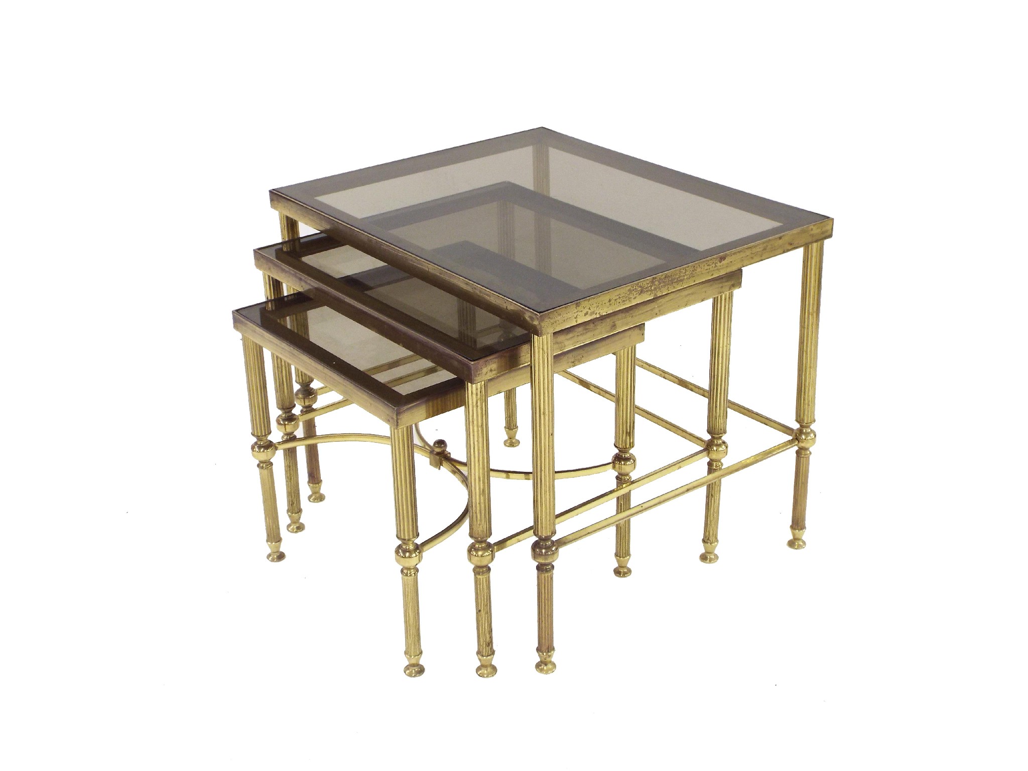 Appraisal: Italian style nest of brass tables with glass tops the