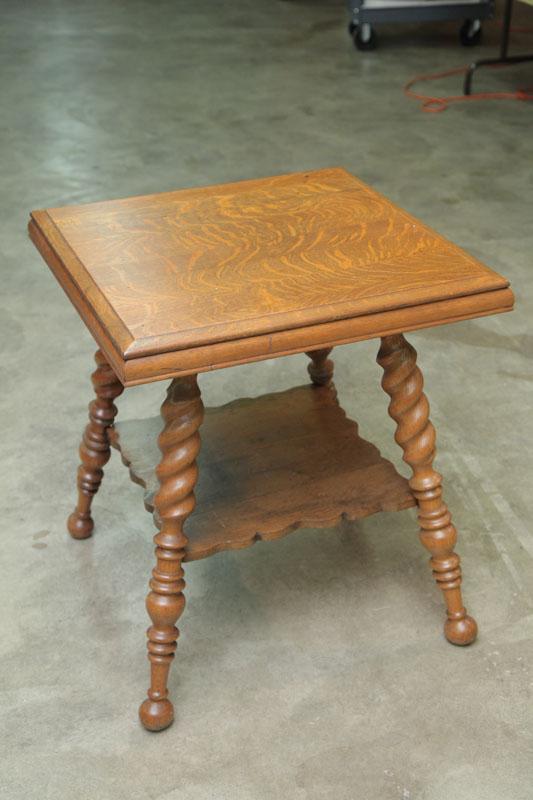 Appraisal: SIDE TABLE Oak with a molded top and lower shelf