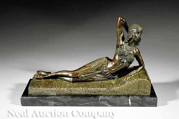 Appraisal: A Continental Art Deco-Inspired Bronze Figure of an Egyptian Woman