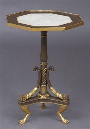 Appraisal: REGENCY CARVED PAINTED AND PARCEL-GILT OCTAGONAL TOP TABLE The cafe