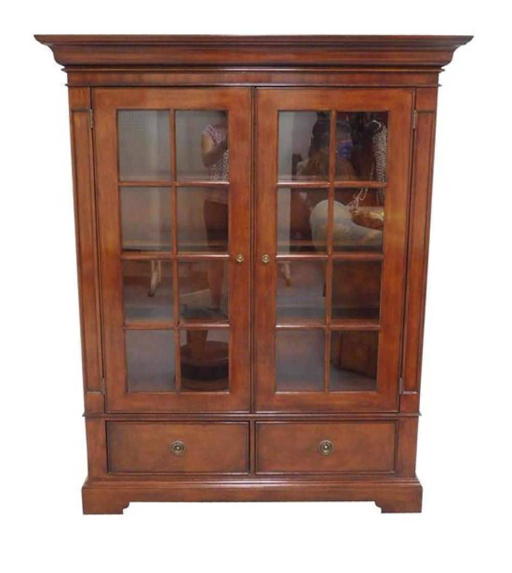 Appraisal: Standing cabinet Sligh Ellis collection mahogany case with thick molded