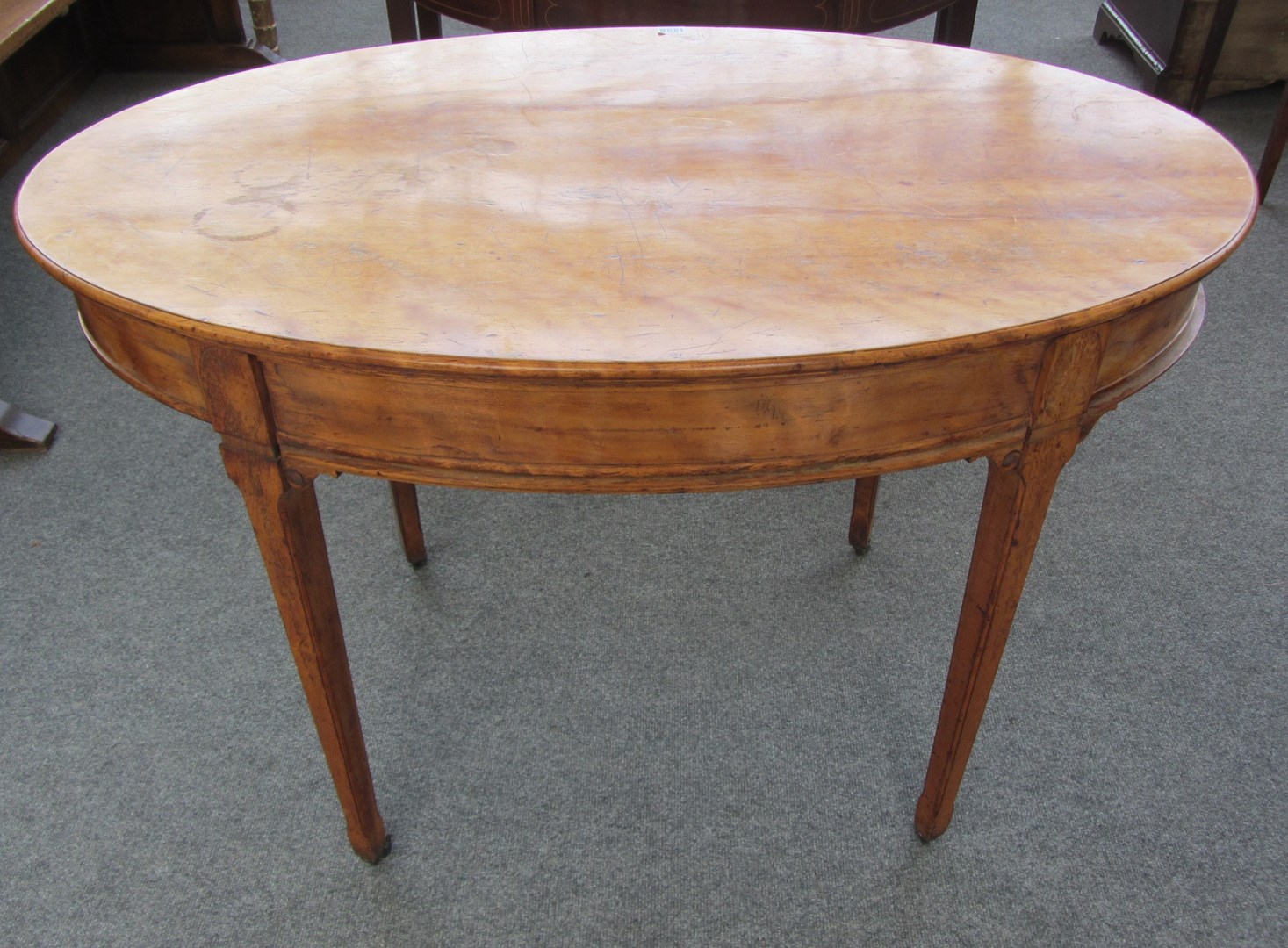 Appraisal: A th century marquetry inlaid satinwood oval centre table on