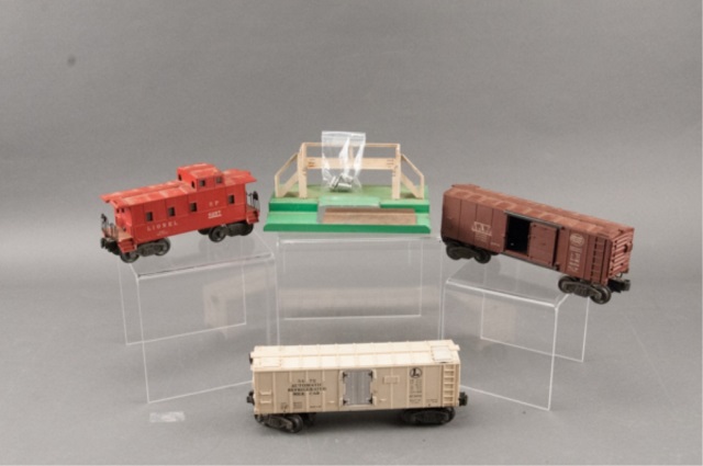 Appraisal: Lionel Refrigerated Milk Car Platform Caboose To include pieces Lionel