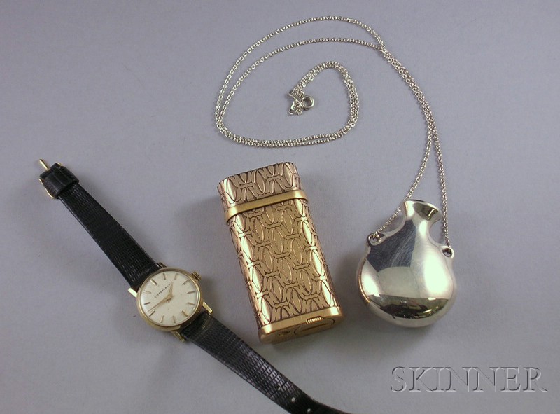 Appraisal: Three Tiffany Co and Cartier Items a Cartier lighter a