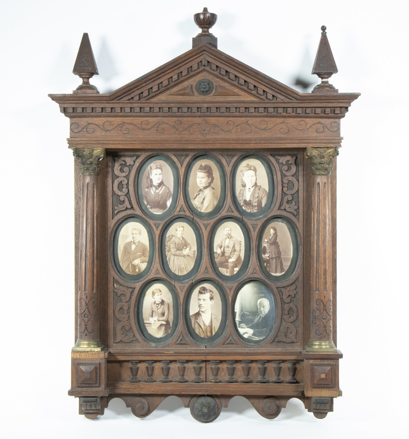 Appraisal: TH C GERMAN WANUT ARCHITECTURAL PHOTO FRAME WITH TEN ANCESTORS