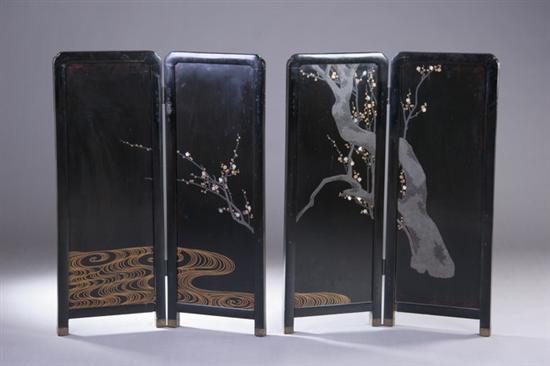 Appraisal: PAIR JAPANESE BLACK LACQUER MOTHER-OF-PEARL INLAID TWO-FOLD SCREENS Prunus tree