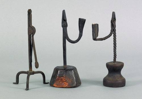 Appraisal: Three wrought iron rush light holders th c h