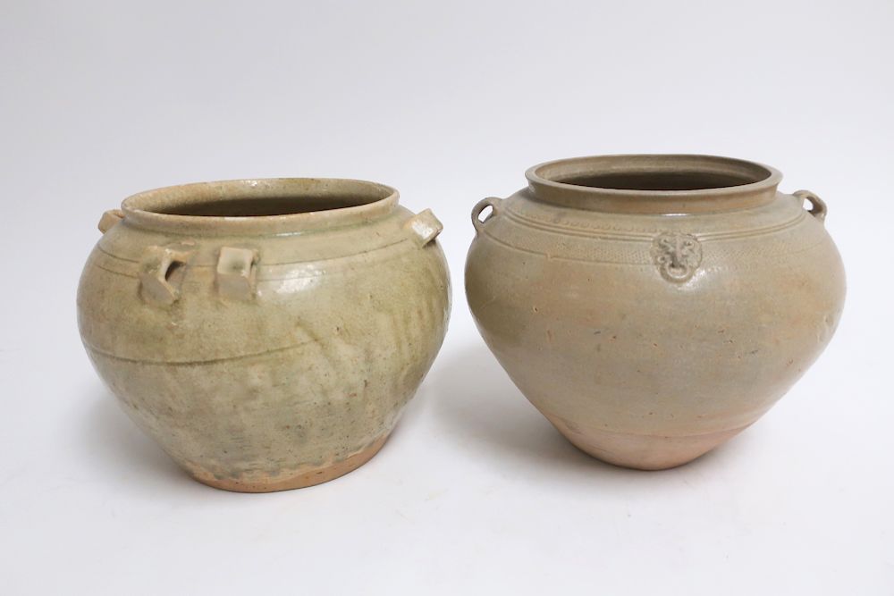 Appraisal: Two Yueyao Jars One jar has simple inscribed registers false