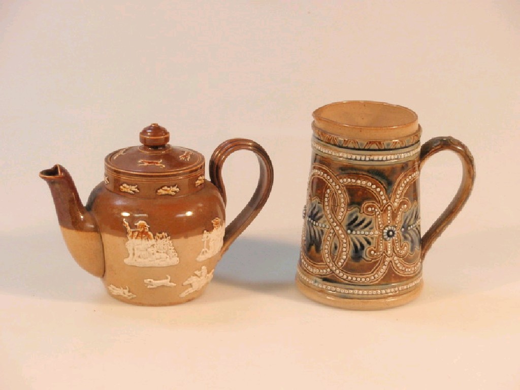 Appraisal: A Doulton stoneware jug incised EL and HH cm and