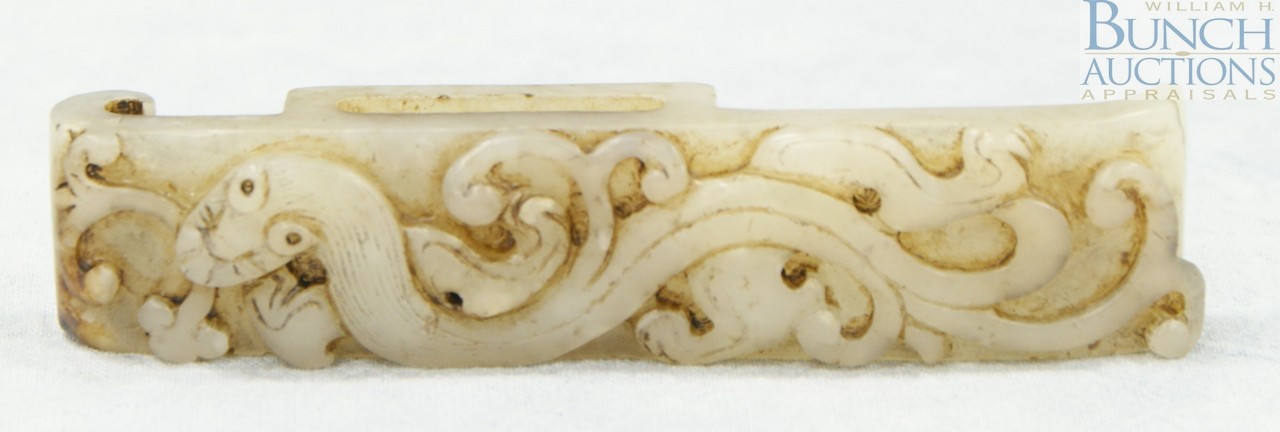 Appraisal: Chinese carved jade dragon belt ornament Approximately wide