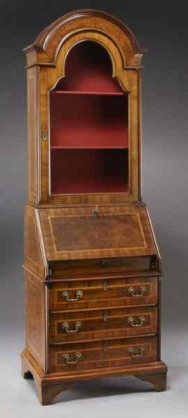 Appraisal: Ladies walnut secretary bookcase witharched top over glazed door the