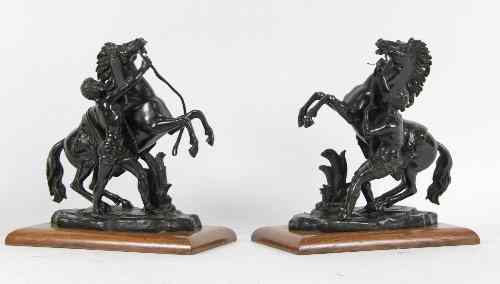 Appraisal: A pair of spelter Marley horses with grooms on rectangular