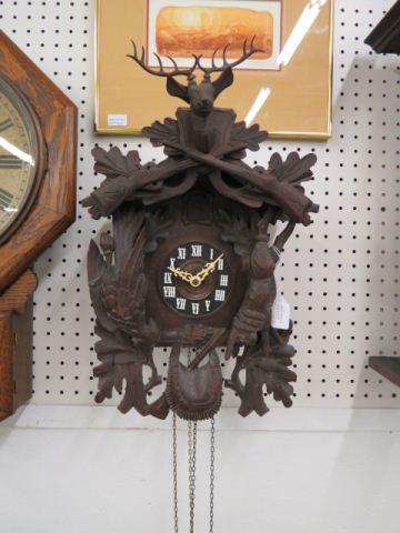 Appraisal: German Carved Black Forest CooCoo Clock deer rifle game decor