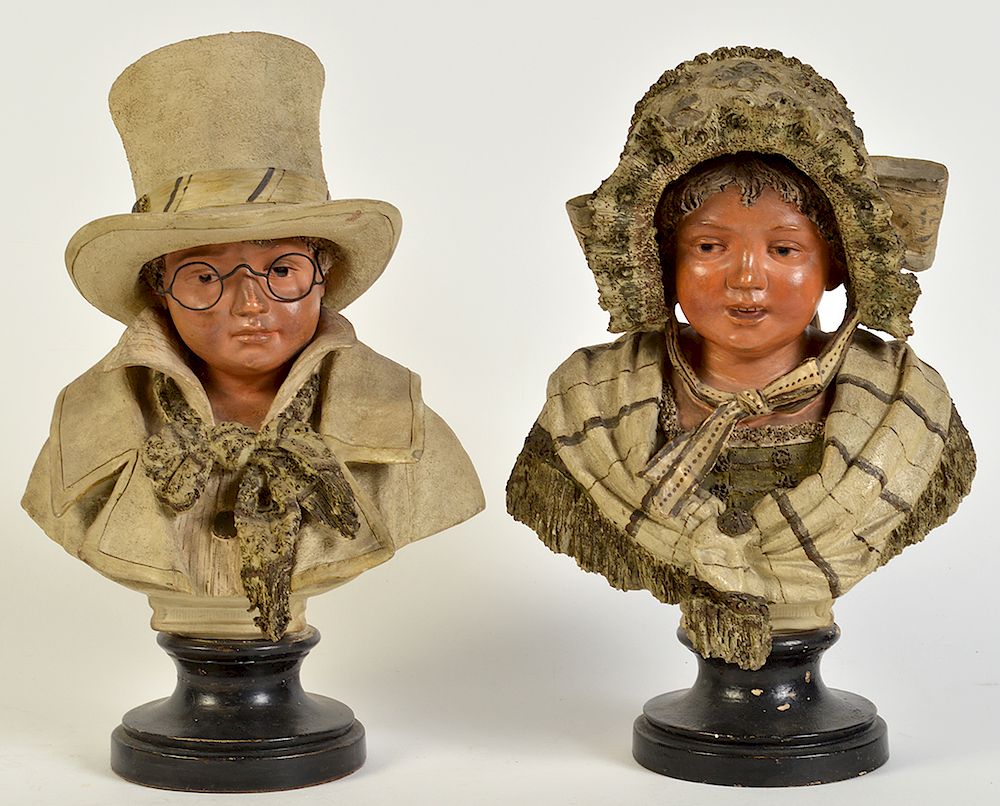 Appraisal: German Terracotta Busts of Boy Girl German terracotta busts on