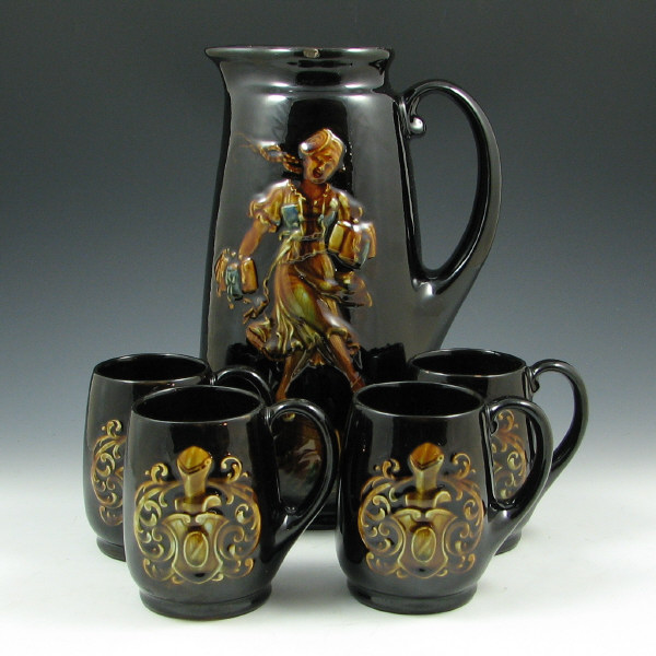 Appraisal: Brush McCoy Olympia Beer Maiden Tankard Mugs Brush McCoy Olympia