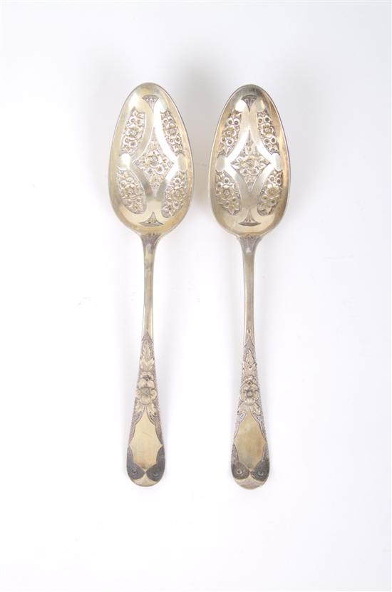 Appraisal: Two English Sterling Silver and Gilded Berry Spoons London Length