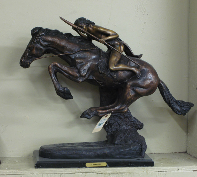 Appraisal: AFTER FREDERIC SACKRIDER REMINGTON American - Cheyenne patinated bronze sculpture