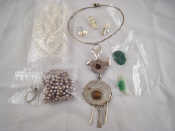 Appraisal: A mixed lot including a white metal pendant necklace signed