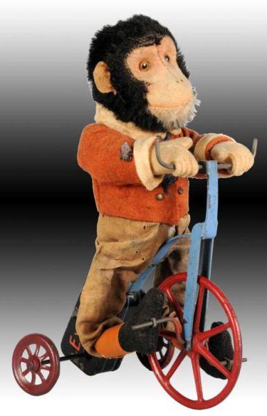 Appraisal: German Bing Wind-Up Monkey on Tricycle Toy Description Wind-up working