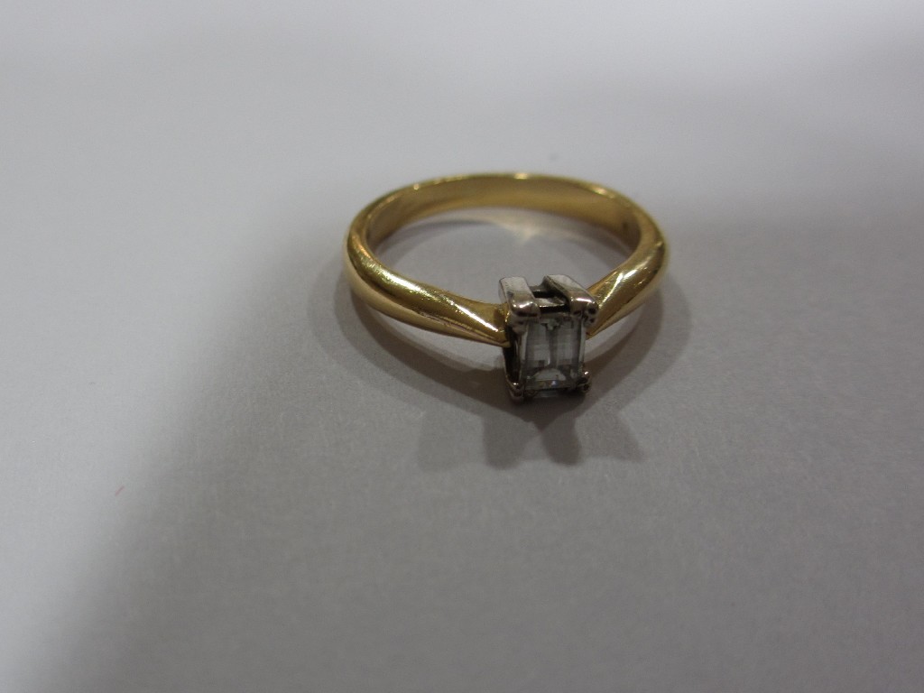 Appraisal: Eighteen carat gold and platinum diamond solitaire ring with millennium