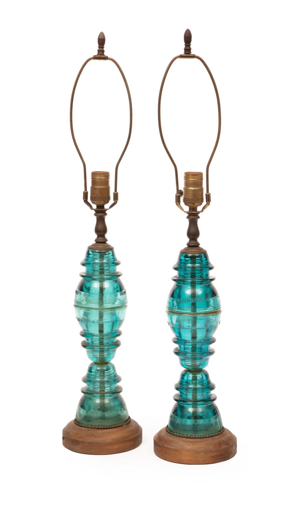 Appraisal: Pair of American Blue Glass Insulator Lamps th c with