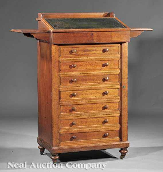 Appraisal: A Regency-Style Mahogany Wellington Desk th c London stamped Howard