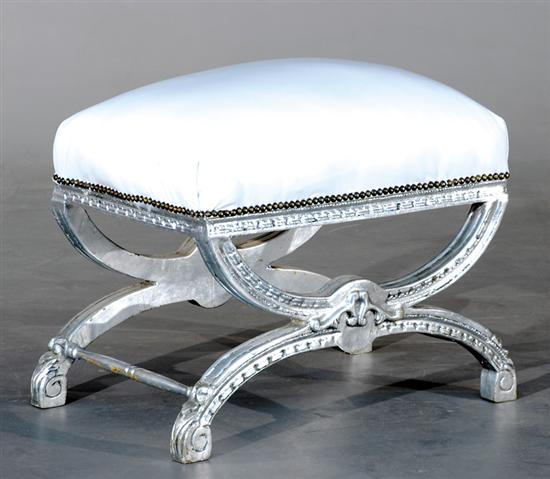 Appraisal: Classical style silvered curule stool rectangular upholstered cushion resting on