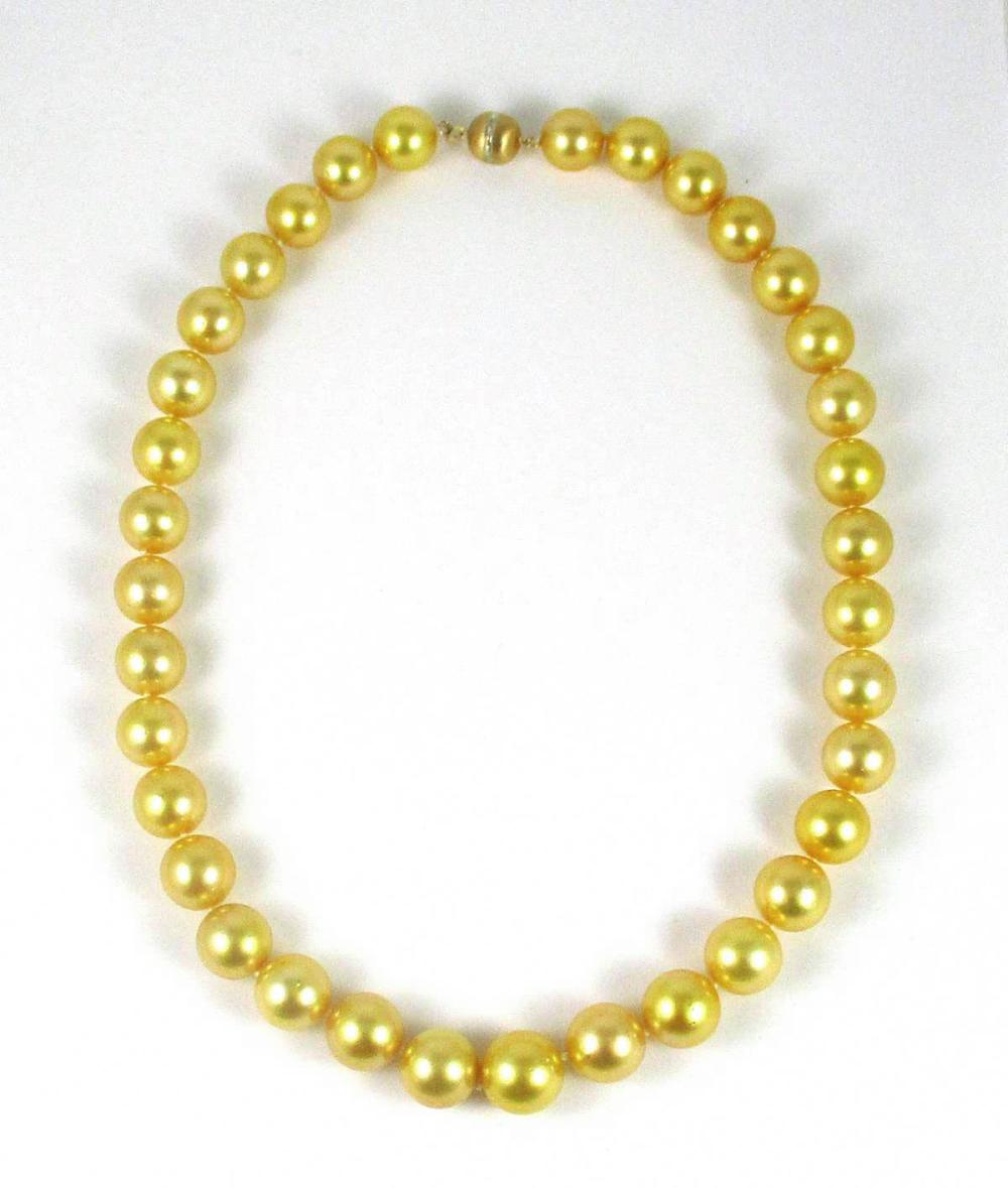 Appraisal: GOLDEN SOUTH SEA PEARL AND FOURTEEN KARAT GOLD NECKLACE -