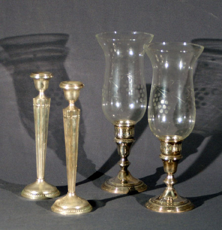 Appraisal: Two Pairs of American Weighted Sterling Candlesticks and a Set