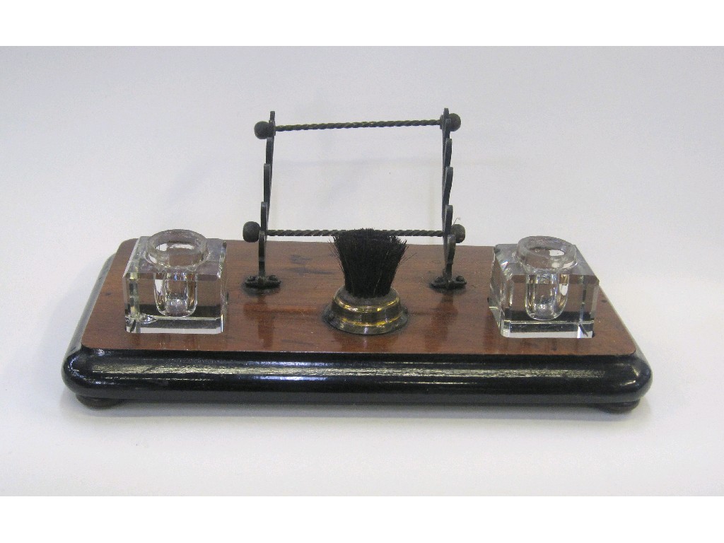 Appraisal: Wooden desk stand with two glass inkwells pen stand and