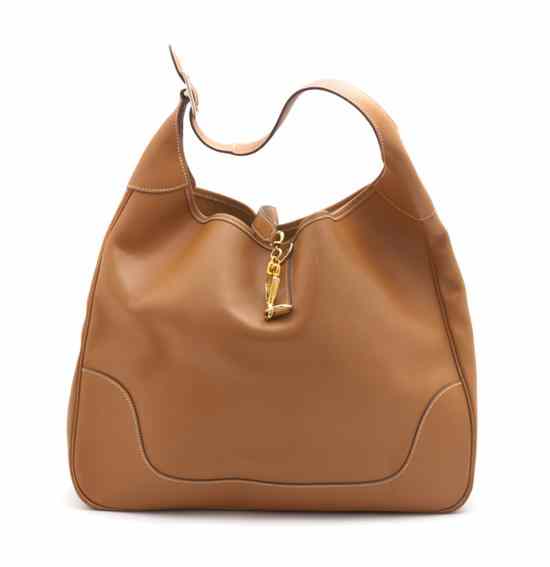 Appraisal: An Hermes 'Trim II' Natural Calf Bag with gold hardware