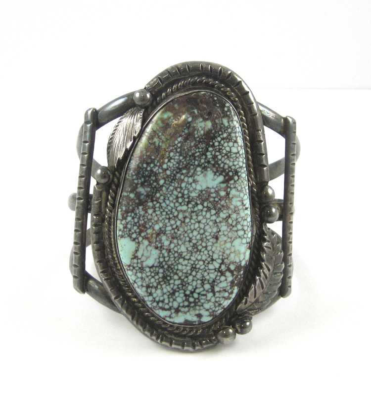 Appraisal: NAVAJO TURQUOISE AND STERLING SILVER CUFF BRACELET attributed to Glen