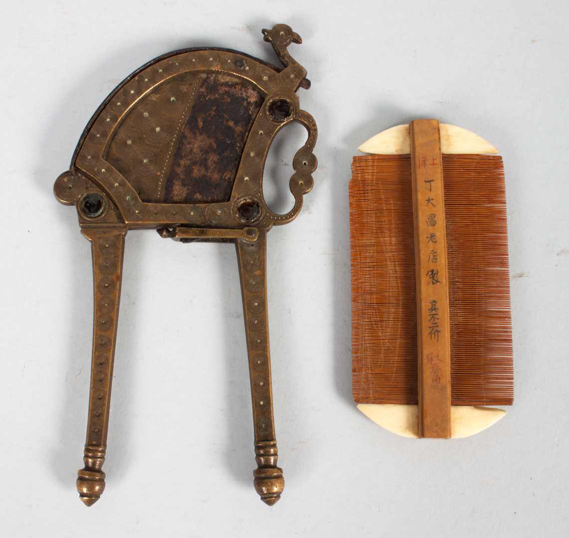 Appraisal: Chinese tobacco cutter and comb brass and steel tobacco beetle