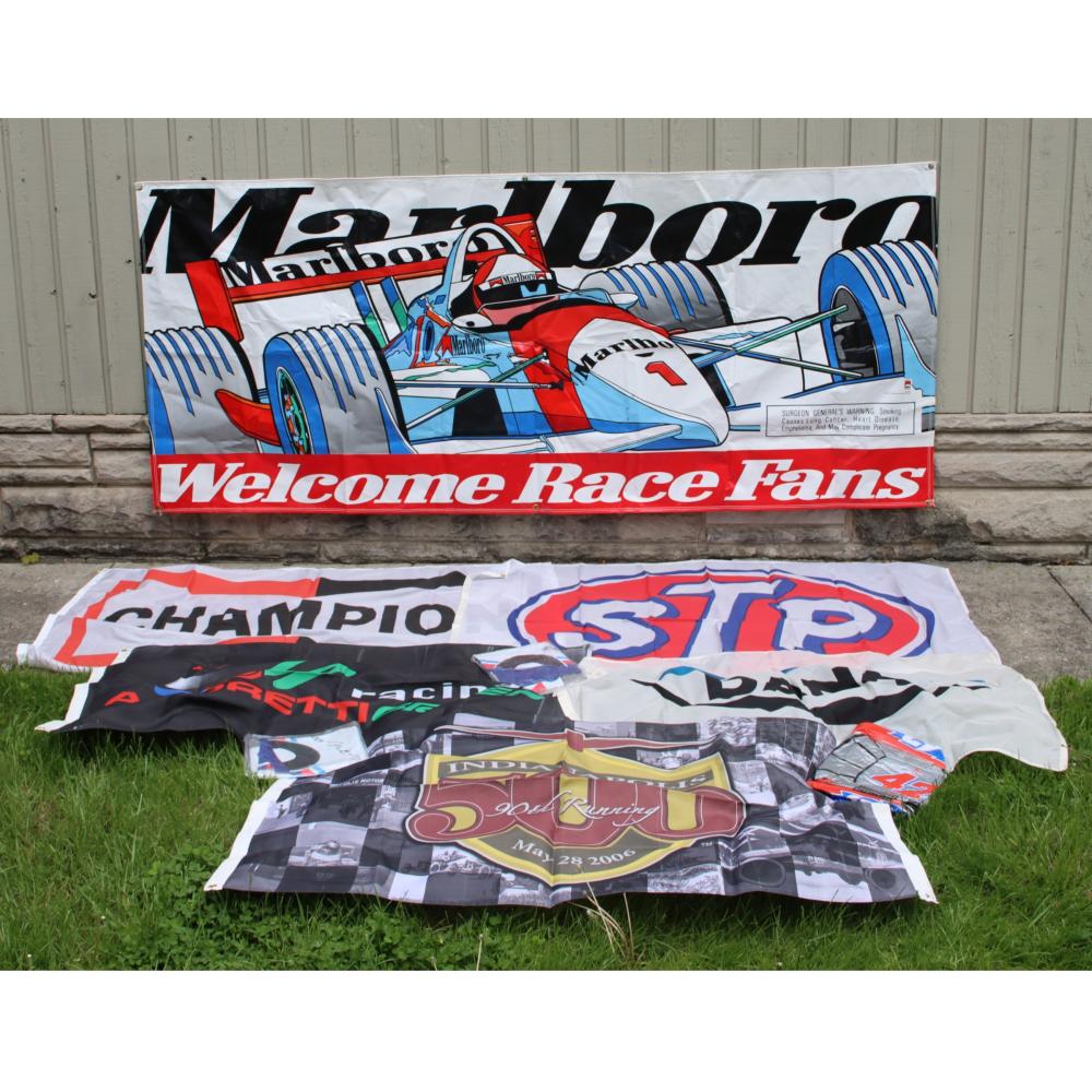 Appraisal: LOT OF RACING FLAGS BANNER INFLATABLES H X W LARGEST