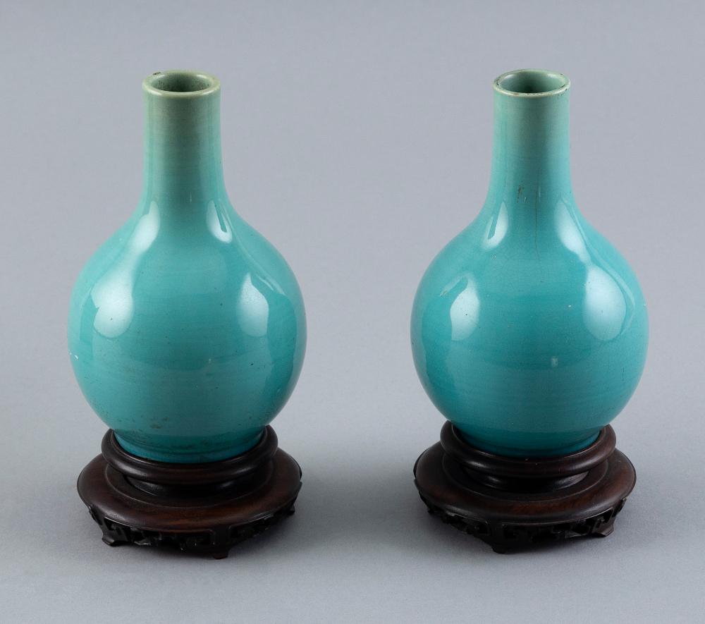 Appraisal: PAIR OF MINIATURE JAPANESE TURQUOISE BLUE PORCELAIN BOTTLE VASES TH