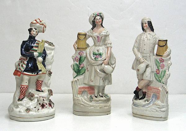 Appraisal: Three Staffordshire pottery figures with shredded clay decoration third quarter