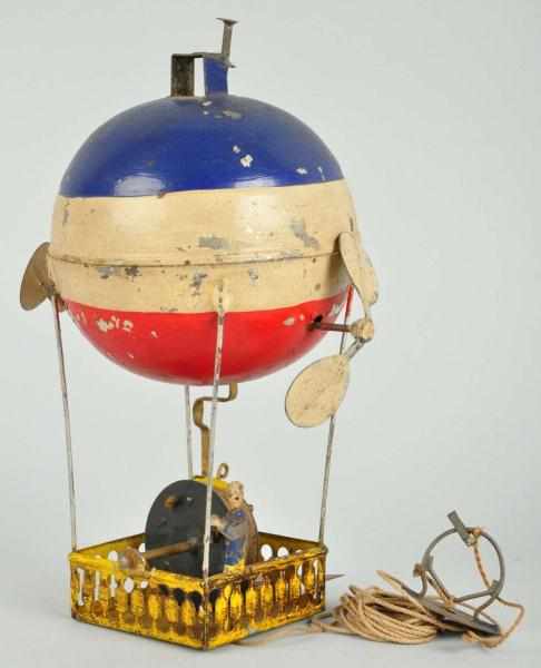 Appraisal: Handpainted Tin Hot Air Balloon Wind-Up Toy Description German Working