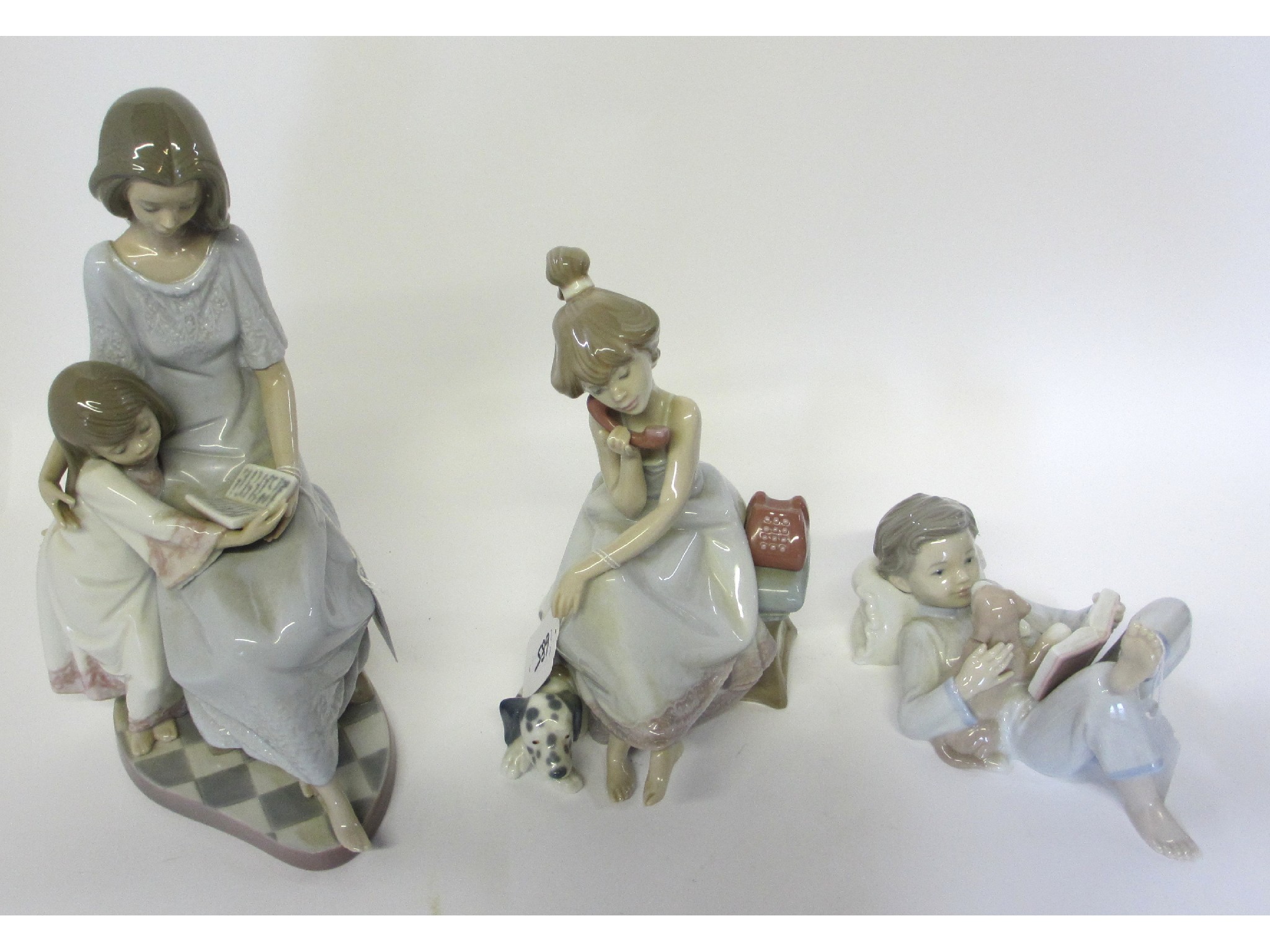 Appraisal: Three Lladro figures to include Bedtime Story Chit Chat and