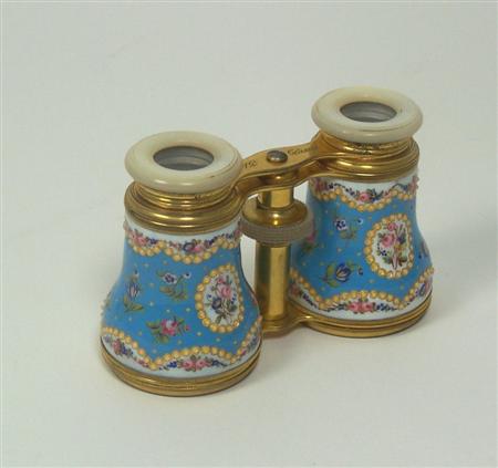 Appraisal: A pair of Victorian enamelled opera glasses of typical form