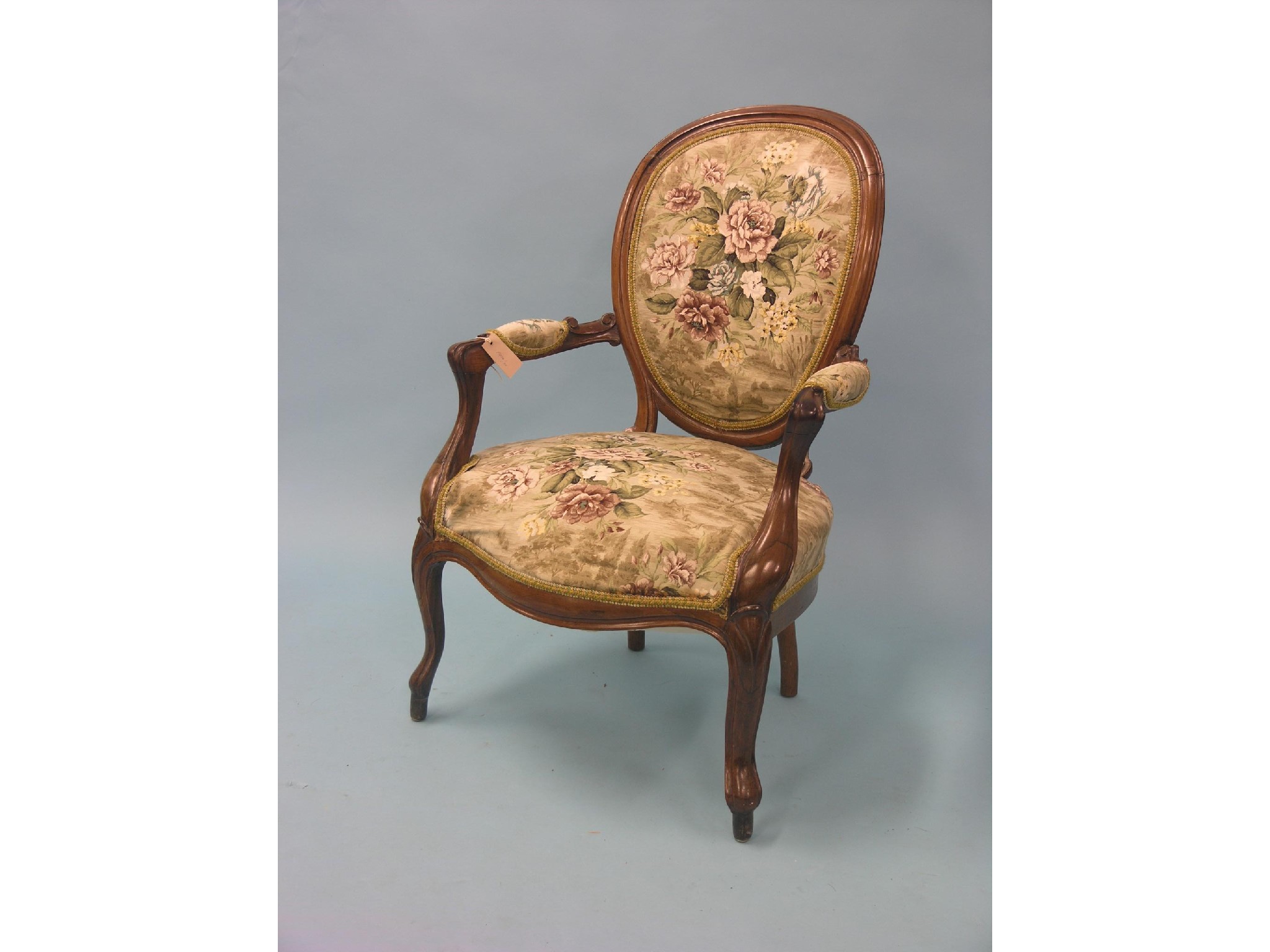 Appraisal: A Victorian rosewood drawing room elbow chair arms carved with