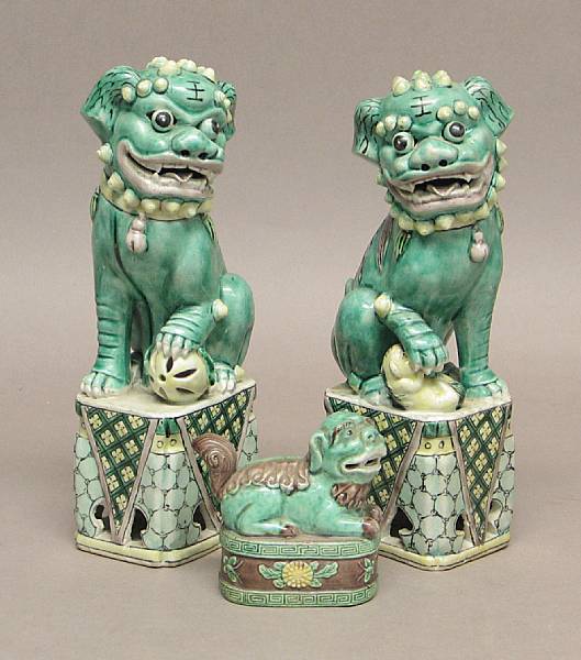 Appraisal: Three famille verte enameled porcelain fu lions including a facing