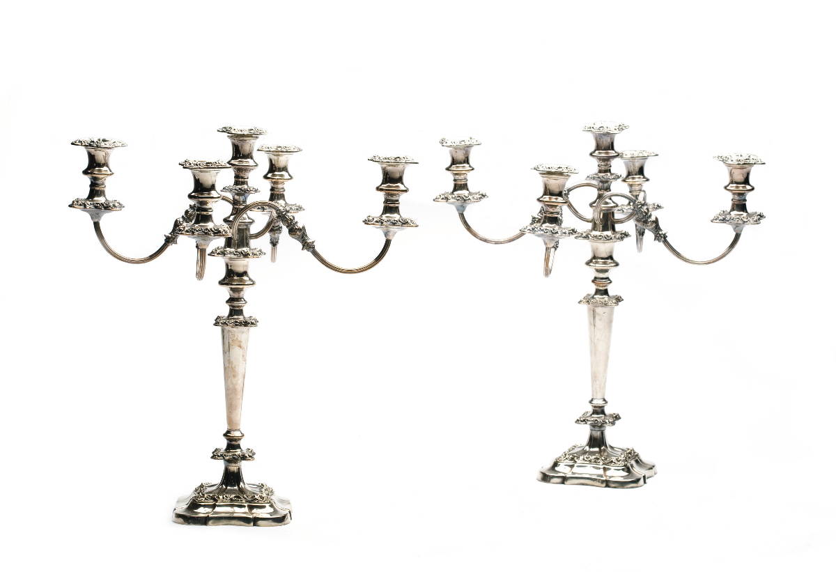 Appraisal: PAIR OF ENGLISH SILVERPLATE FIVE-LIGHT CANDELABRA OF SHAPED SQUARE FORM