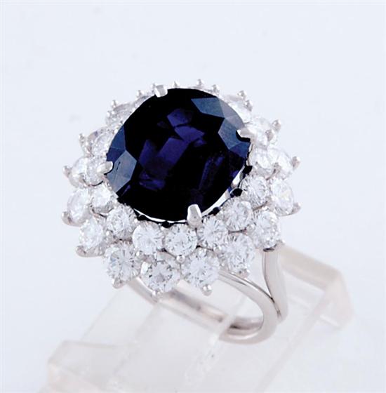 Appraisal: Sapphire diamond and platinum cocktail ring ct deep-blue cushion-cut sapphire