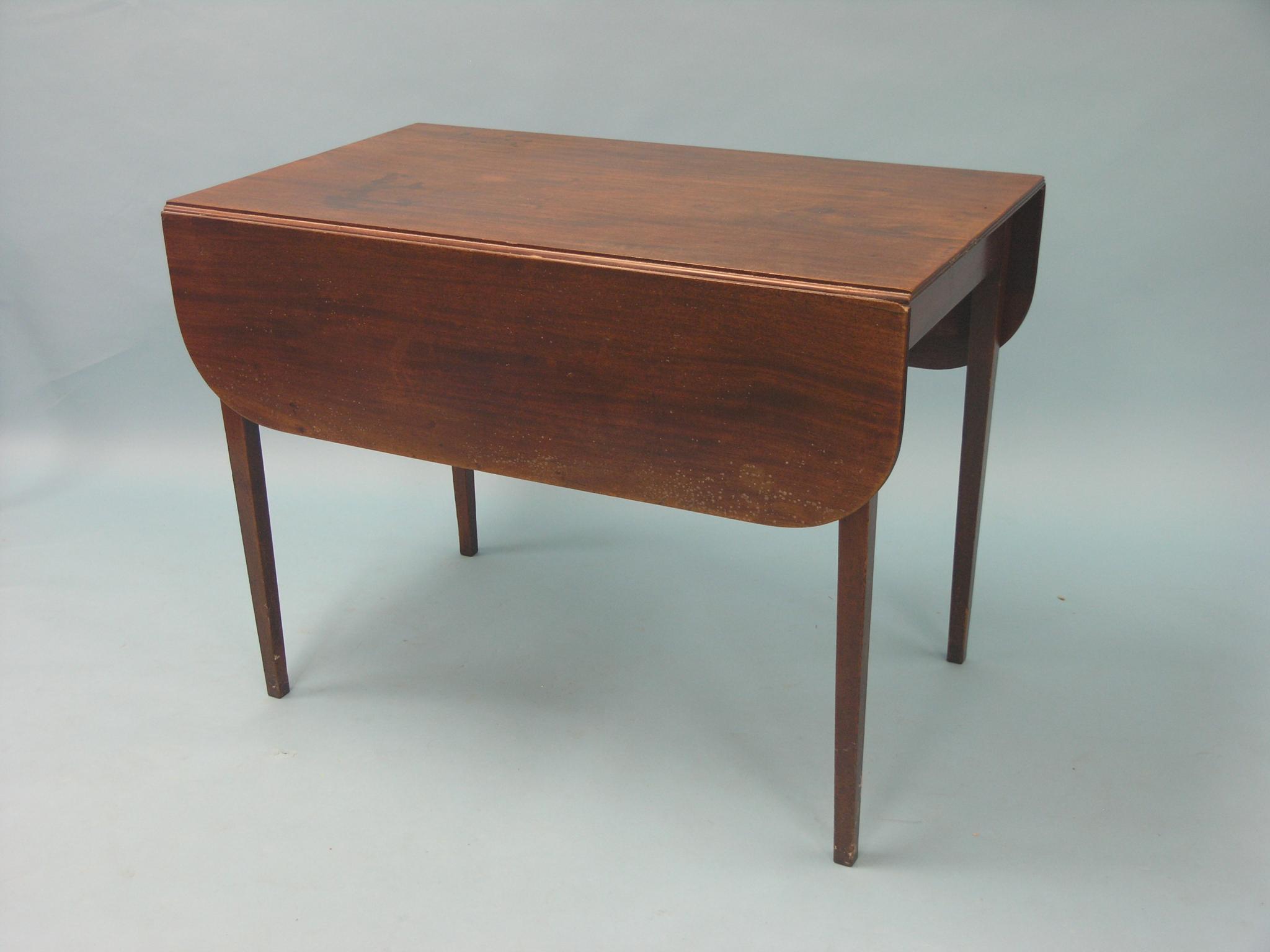 Appraisal: A Victorian mahogany Pembroke table on square tapering legs ft