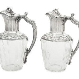 Appraisal: A Pair of French Silver and Glass Claret Jugs Circa