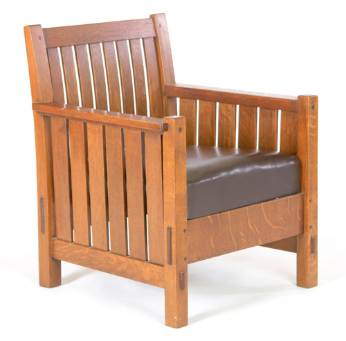 Appraisal: L J G STICKLEY Cube armchair with drop-arms curved back