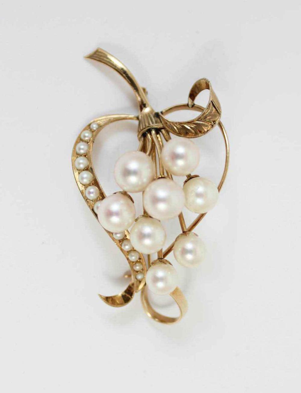 Appraisal: PEARL AND FOURTEEN KARAT GOLD FLORAL BROOCH with a cluster