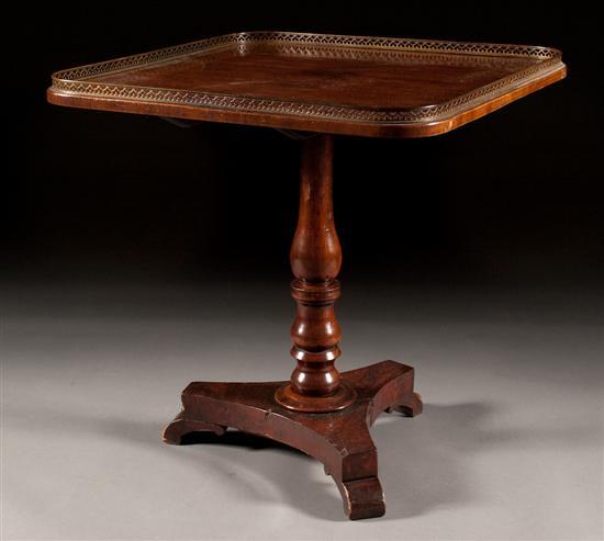 Appraisal: Restoration style mahogany square tea table with reticulated brass gallery