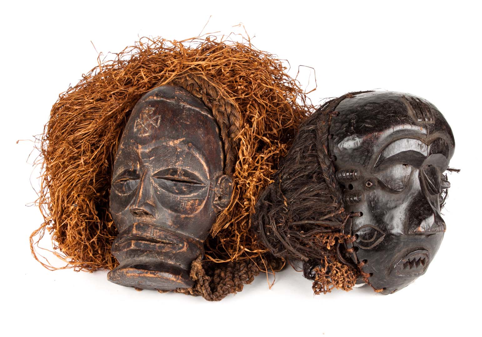 Appraisal: Two Chokwe masks with raffia hoods from Congo Kishasa each