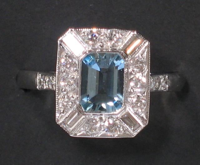 Appraisal: AN ART DECO STYLE AQUAMARINE AND DIAMOND DRESS RING the